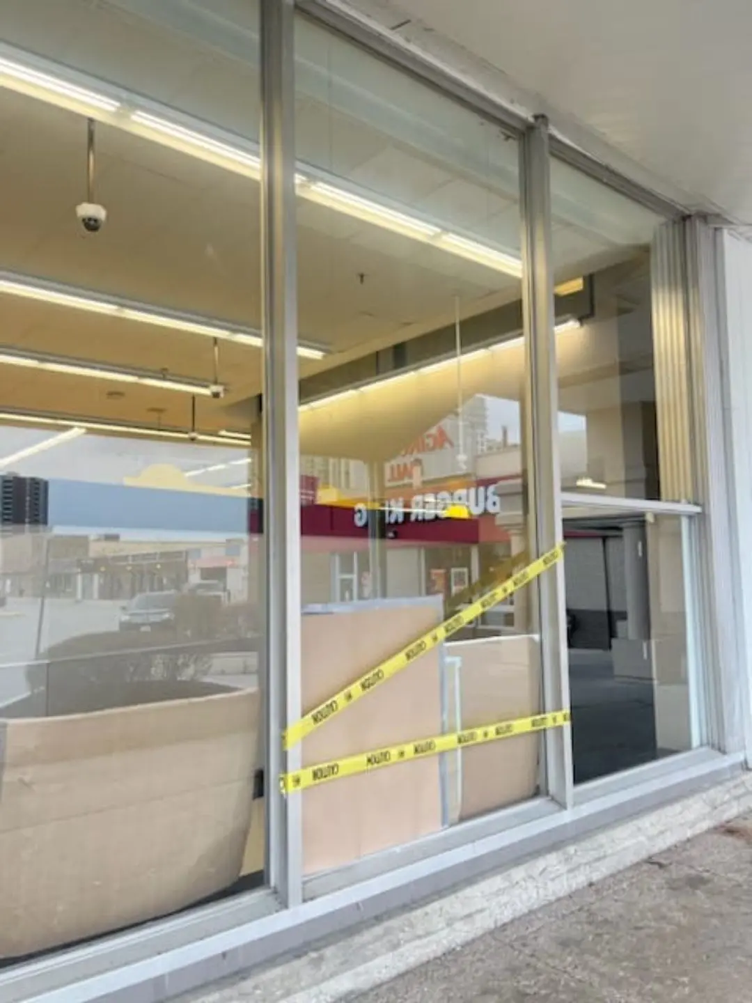 Shop door repair London - fixing shopfront door closer and alignment